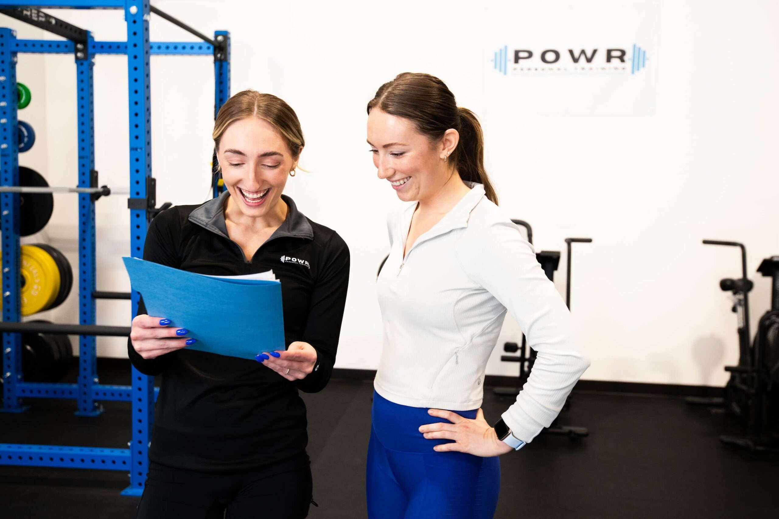 A POWR coach reviewing a personalized plan with a client