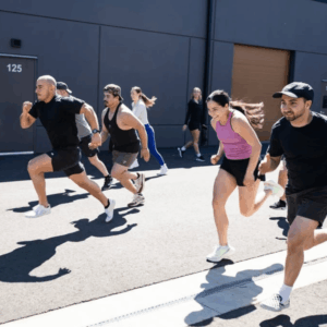 POWR members sprinting outside the studio during a group workout