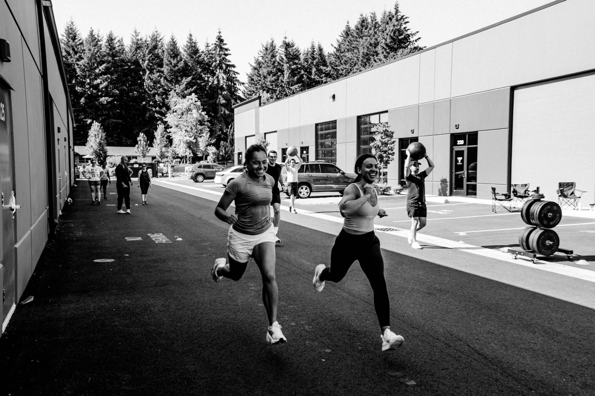 POWR members training together outside the Camas studio